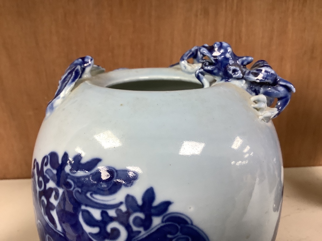 A Chinese blue ground blue and white dragon design vase, 17cm high